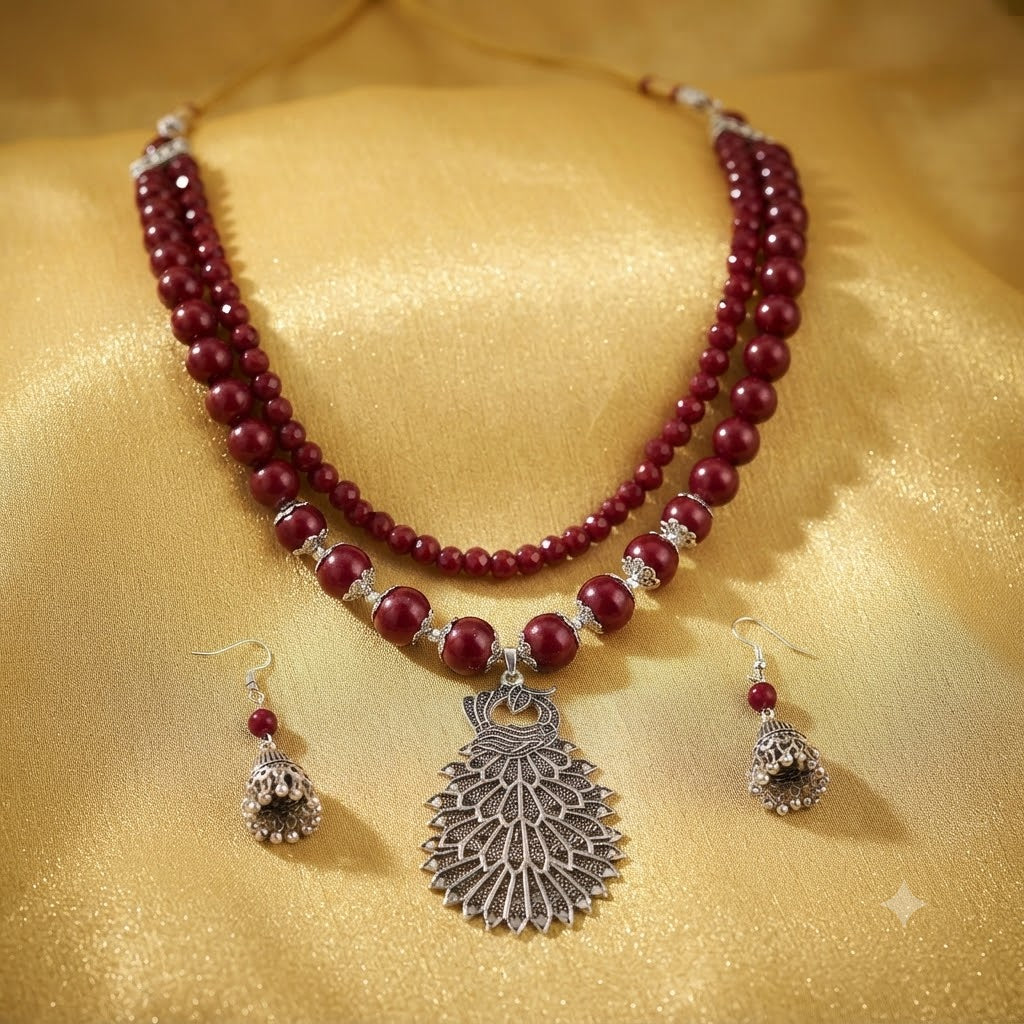 JFL - Jewellery for Less Maroon Beaded Double Layer Necklace Set with Oxidized Peacock Pendant & Matching Jhumkas – Ethnic Jewellery Set for Women
