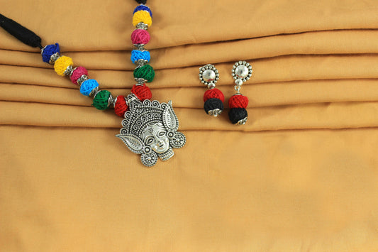 JFL-Jewellery for Less Multicolour Cotton Thread Jewellery Set–Necklace,Earrings with Oxidised Silver Ornate Face Pendant, Matching Beadwork & Dangling Charms––Navratri, Garba