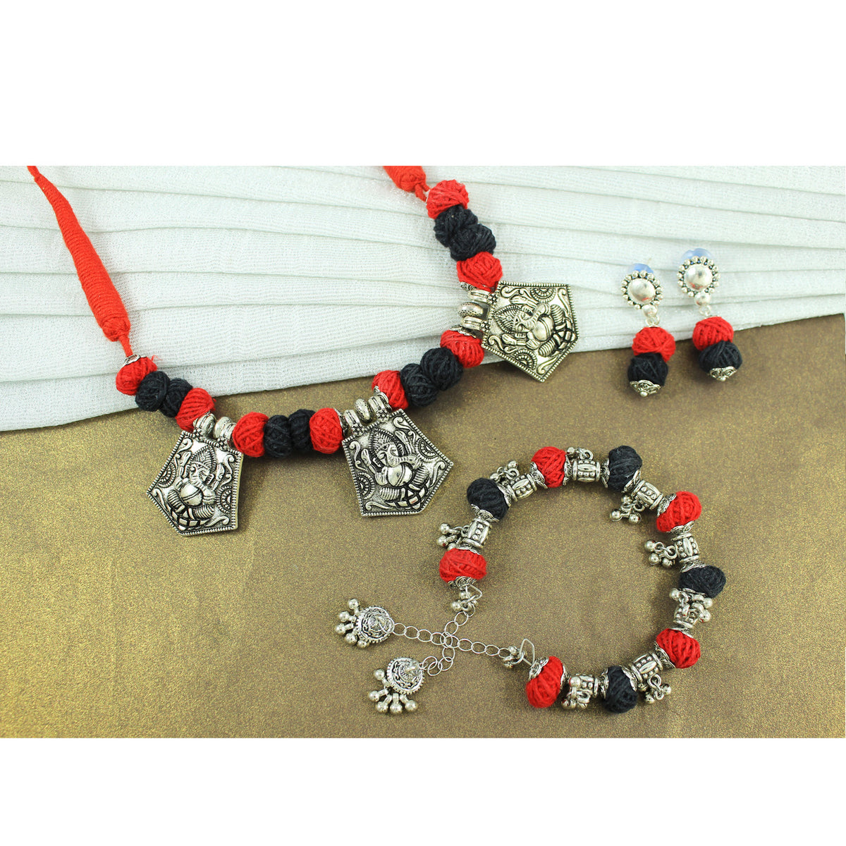 JFL‑Jewellery for Less Red & Black Thread Beaded Jewellery Set–Necklace, Earrings & Bracelet with Oxidised Silver Triple Ganesha Pendants & Dangling Charms– Women & Girls–Navratri, Garba