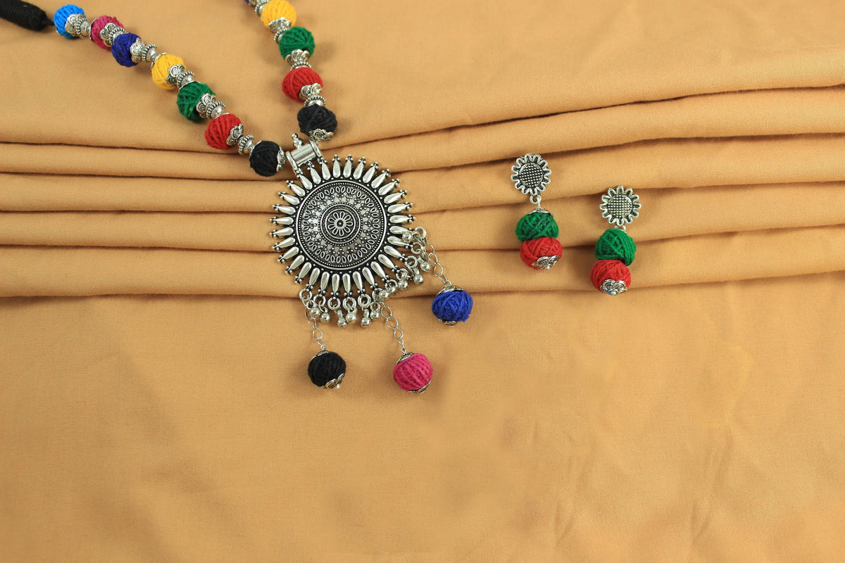 JFL-Jewellery for Less Multicolour Cotton Thread Jewellery Set – Necklace,Earrings & Bracelet with Oxidised Silver Ornate Pendant, Matching Beadwork & Dangling Charms – Navratri, Garba