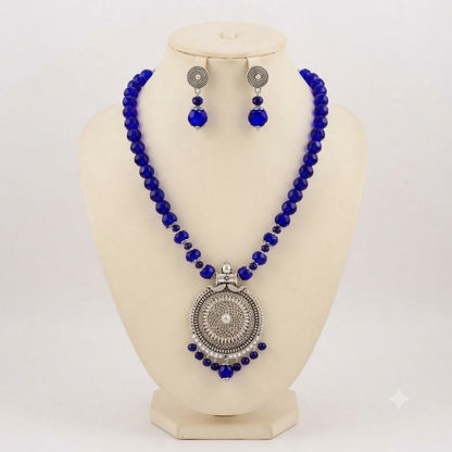 JFL - Jewellery for Less Oxidized German Silver Round Pendant Royal Blue Beads Necklace with Earrings Set for Women | Antique Silver Filigree Design Jewellery Set | Navratri Special Traditional Jewellery