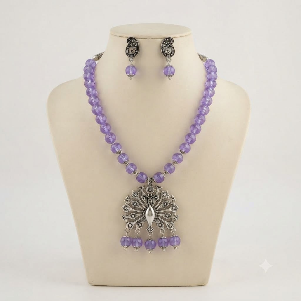 JFL - Jewellery for Less Oxidized German Silver Peacock Pendant Purple Crystal Beads Necklace with Earrings Set for Women | Antique Silver Design Jewellery Set | Navratri Special Traditional Jewellery