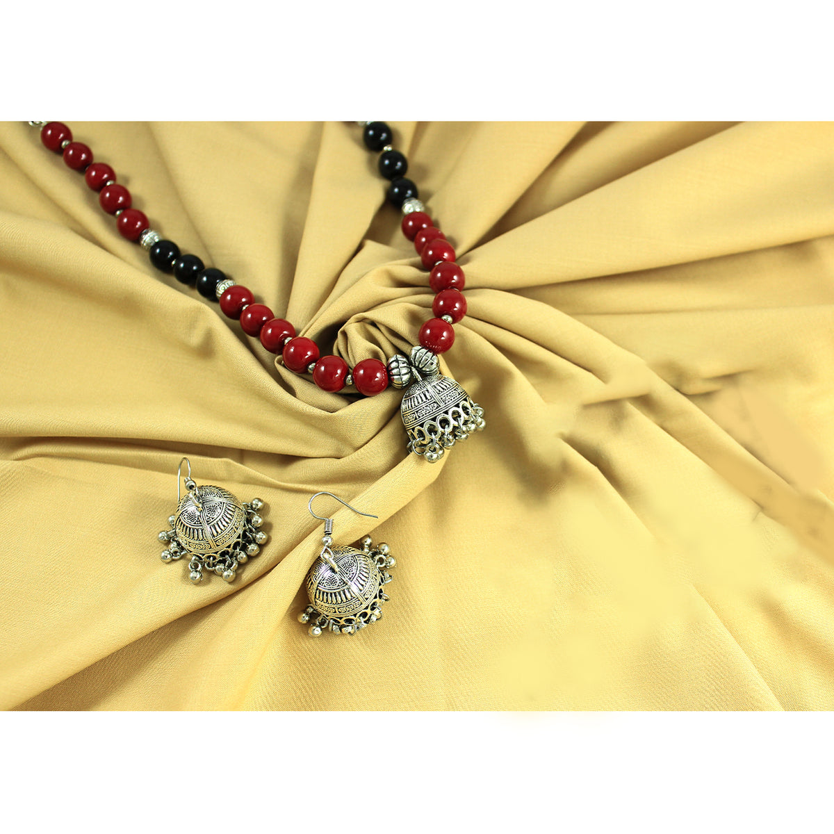 JFL – Jewellery for Less Maroon & Black Beaded Necklace with Oxidised Silver Floral Jhumka Pendant, Matching Jhumka Earrings – Traditional Jewellery for Women & Girls – Navratri, Garba