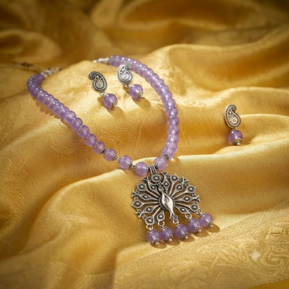 JFL - Jewellery for Less Oxidized German Silver Peacock Pendant Purple Crystal Beads Necklace with Earrings Set for Women | Antique Silver Design Jewellery Set | Navratri Special Traditional Jewellery
