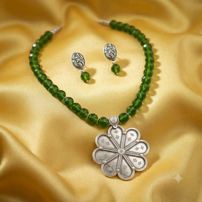 JFL - Jewellery for Less Oxidized Silver Floral Pendant Green Beaded Necklace Earrings Set for Women – Navratri Special Traditional Jewellery Set