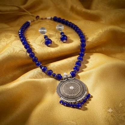 JFL - Jewellery for Less Oxidized German Silver Round Pendant Royal Blue Beads Necklace with Earrings Set for Women | Antique Silver Filigree Design Jewellery Set | Navratri Special Traditional Jewellery