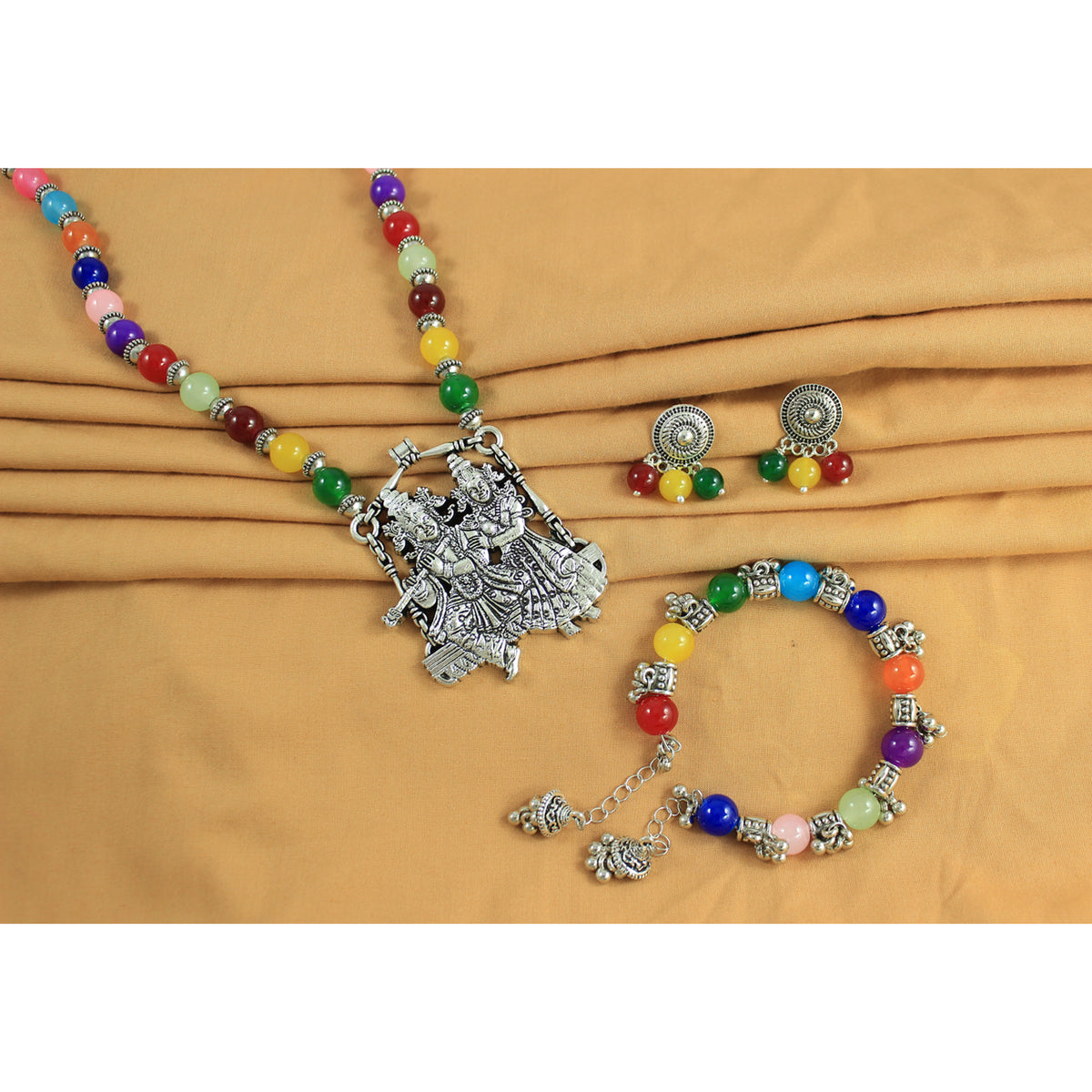JFL – Jewellery for Less Multicolor Beaded Oxidised Silver Temple Jewelry Set for Women | Radha Krishna Pendant Necklace with Earrings & Bracelet | Ethnic Festive Navratri