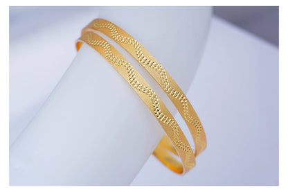 Gold Plated Waves Dotted New Bangles Designs . 2.8