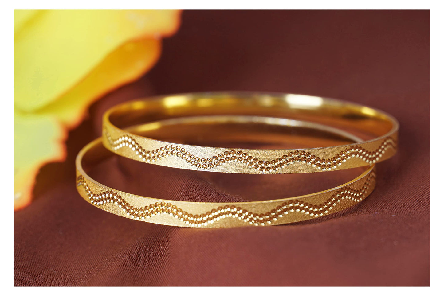 Gold Plated Waves Dotted New Bangles Designs . 2.8