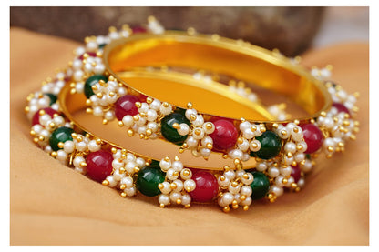 Gold Plated Cluster Pearl And Red & Green Color Beads Bangle Set (Set Of 2)