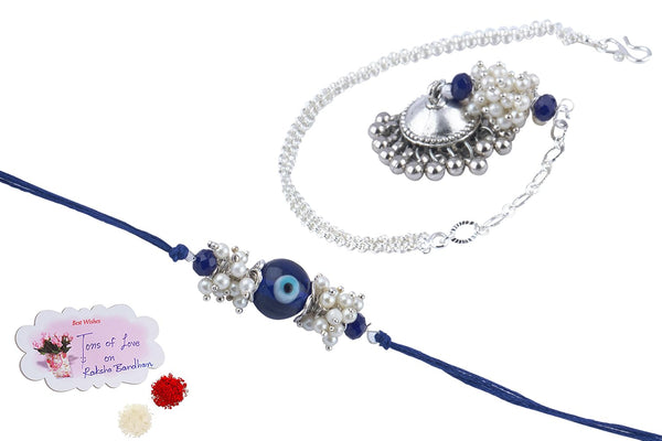 Forless Handmade Rakhi Combo Couple Pair Blue Evil Eye Rakhi And Silver Plated Jhumki Pearl Bracelet For Bhaiya Bhabhi With Roli Chawal And Written Greeting Note