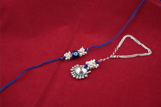 Forless Handmade Rakhi Combo Couple Pair Blue Evil Eye Rakhi And Silver Plated Jhumki Pearl Bracelet For Bhaiya Bhabhi With Roli Chawal And Written Greeting Note