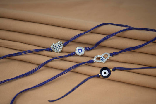 Rakhi Combo Set Of 4 For Bhaiya Evil Eye Protection & Heart Rakhis With Cz Diamonds, Roli Chawal And Written Greeting Note.