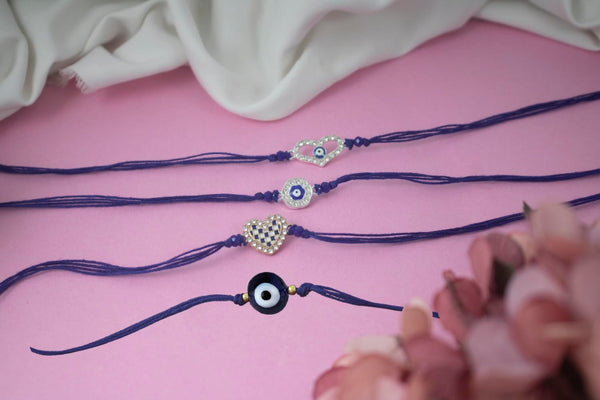 Rakhi Combo Set Of 4 For Bhaiya Evil Eye Protection & Heart Rakhis With Cz Diamonds, Roli Chawal And Written Greeting Note.