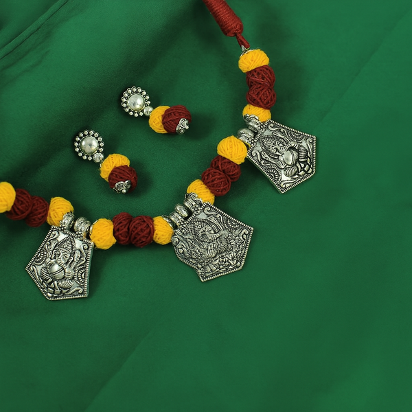 JFL‑Jewellery for Less Maroon & Yellow Cotton Thread Jewellery Set – Necklace, Earrings with Oxidised Silver Lord Ganesha Pendant– Jewellery for Women & Girls – Navratri,Garba