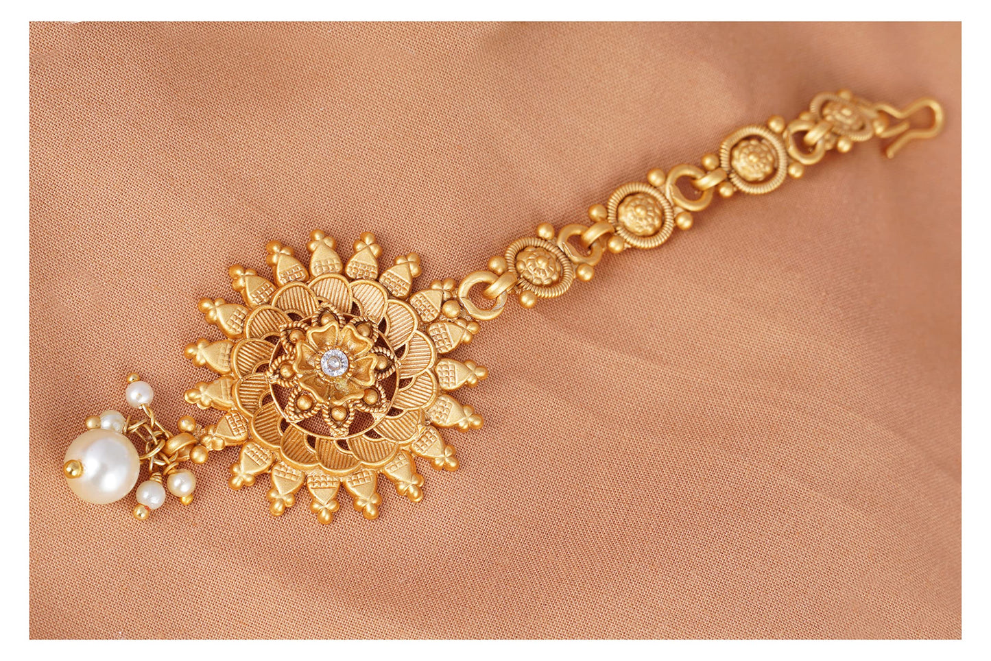 Matte Gold Plated Floral White Stone With Drop Dangler Mangtika .