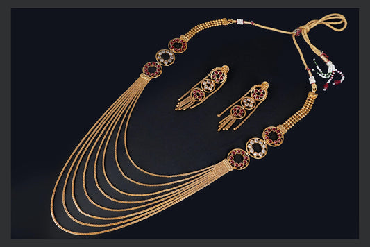 Gold Plated Multistrand Chain Ruby Red And White Color Stone Studded Fancy Necklace Set.
