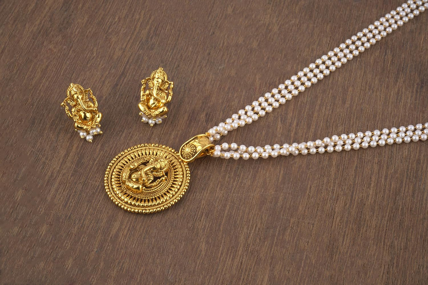 Gold Plated Lord Ganesh Pendant Pearl String Chain With Earring .