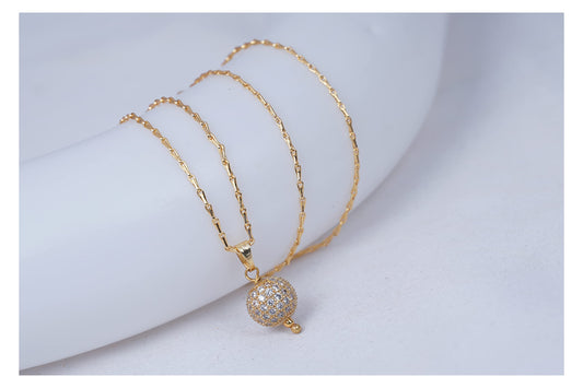 Gold Plated American Diamond Studded Single Ball Pendant With Chain .
