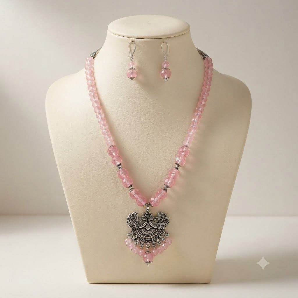 JFL - Jewellery for Less Oxidized German Silver Twin Peacock Pendant Pink Crystal Beads Necklace with Earrings Set for Women | Antique Silver Design Jewellery Set | Navratri Special Traditional Jewellery
