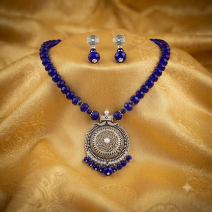 JFL - Jewellery for Less Oxidized German Silver Round Pendant Royal Blue Beads Necklace with Earrings Set for Women | Antique Silver Filigree Design Jewellery Set | Navratri Special Traditional Jewellery