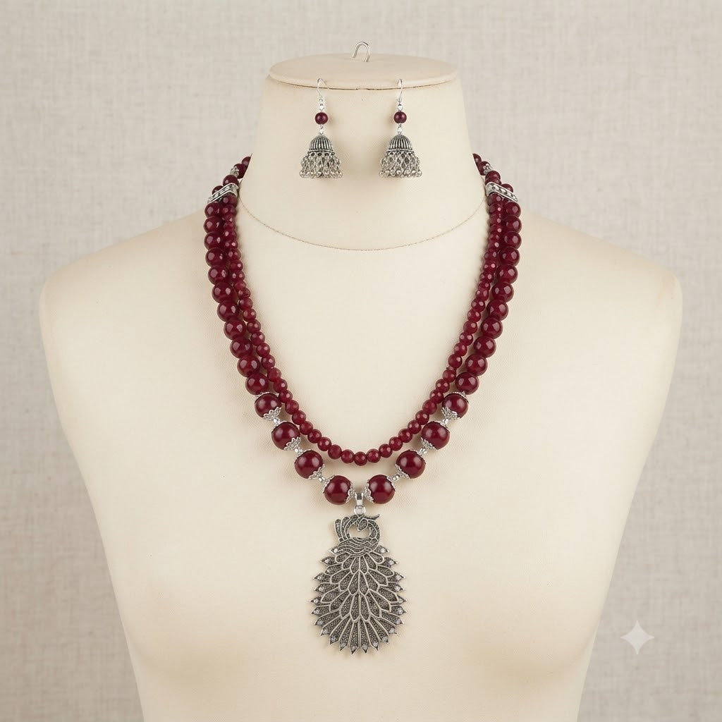 JFL - Jewellery for Less Maroon Beaded Double Layer Necklace Set with Oxidized Peacock Pendant & Matching Jhumkas – Ethnic Jewellery Set for Women