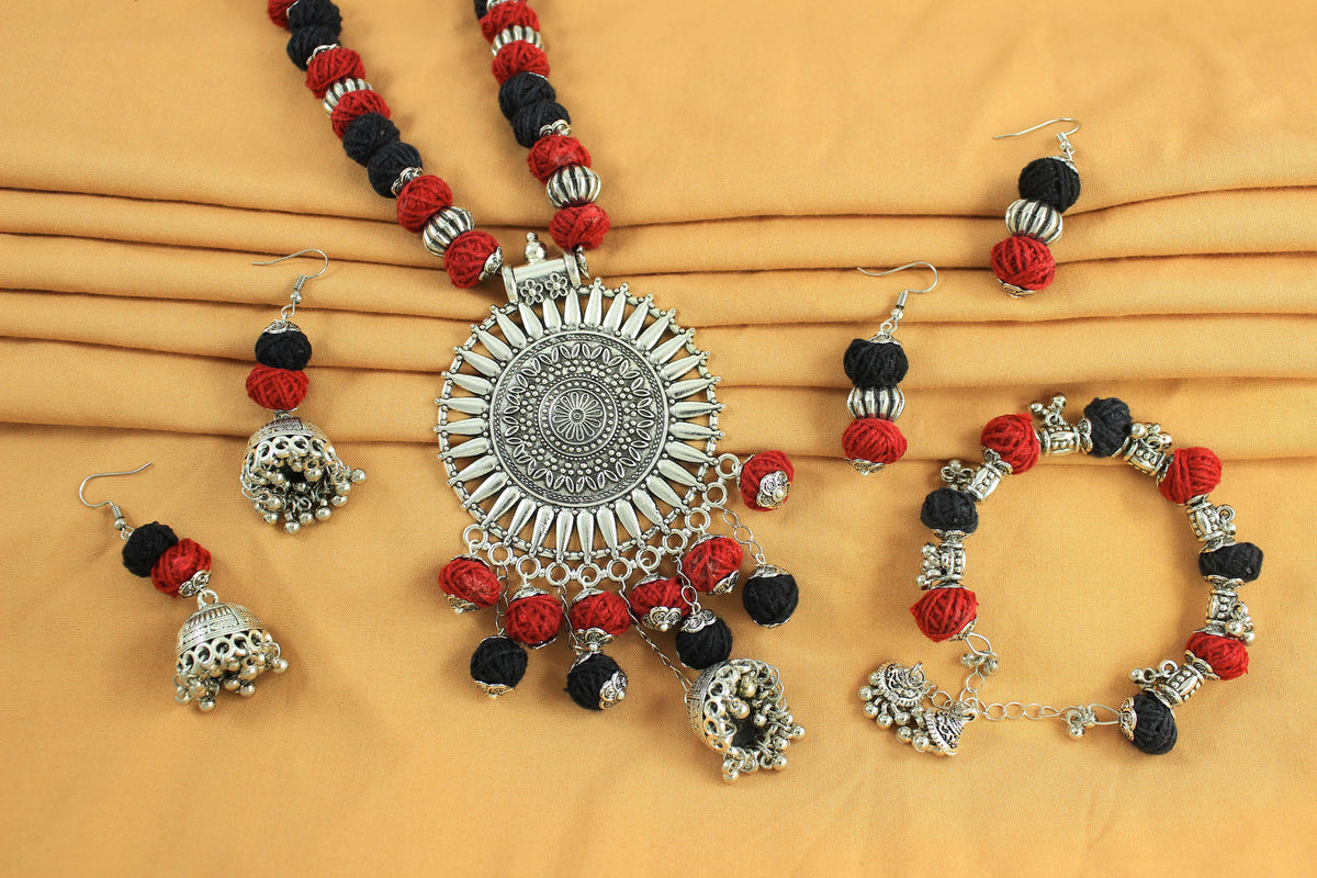 JFL‑Jewellery for Less Red & Black Cotton Thread Jewellery Set – Necklace,Bracelet & 2Pairs of Earrings with Oxidised Silver Circular Floral Pendant, Jhumka Danglers & Bead Drops –Navratri,Garba